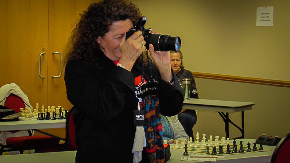 Sheryl McBroom was one of three photographers providing magnificent RRSO XVII photos.  Sheryl is a Veteran and full-time student studying art and photography.  She is a familiar face taking photos at many Texas tournaments.  The Texas Chess Association Facebook page is filled with her chess photos.  Photo by Mke Tubbs.